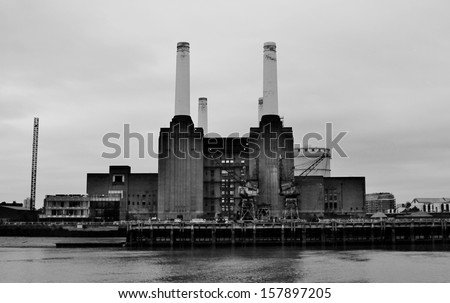 Derelict London Icon Battersea Power station across the Thames river in England