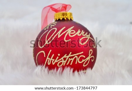 Red silver christmas decoration with fake snow made of white fur