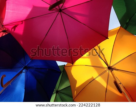 umbrellas rainbow from below