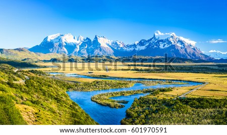 Mountain river panorama landscape. Mountain river and snow covered mountains background