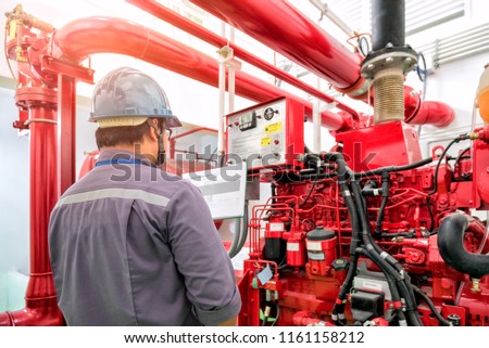 Engineer check generator pump for water sprinkler piping and fire protection system.