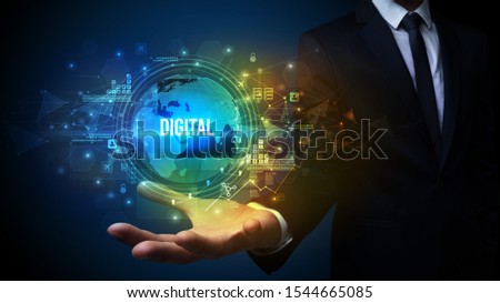 Elegant hand holding DIGITAL inscription, digital technology concept