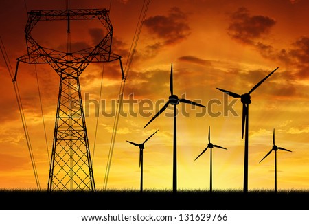Wind turbines with power line in the sunset