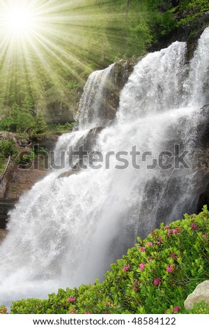 beautiful waterfall Vallesinella in the National Park Adamello-Brenta - Italy Dolomites