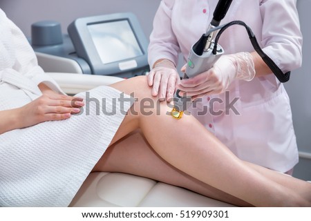 Laser epilation and cosmetology.  Hair removal cosmetology procedure. Laser epilation and cosmetology. Cosmetology and SPA concept.