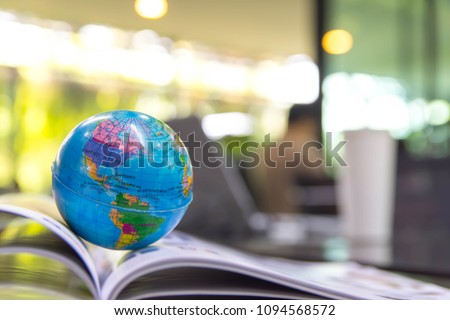 World globe on text book.    \
International education school Concept.