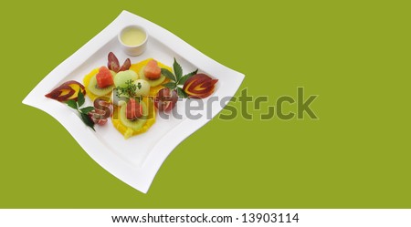Nice healthful, fresh fruits composition on the beautiful plate