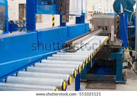 Production line for manufacturing of the engines factory. Factory. Engine factory. New engine factory. Engines on line. Steel beam on the line