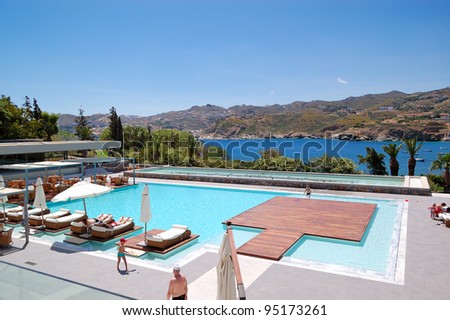 CRETE ISLAND, GREECE - MAY 17: The tourists enjoying their vacation at luxury hotel on May 17, 2010 in Crete, Greece. 15000000 tourists have visited Greece in year 2010