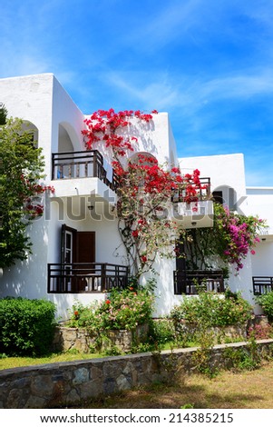 Villas decorated with flowers at luxury hotel, Crete, Greece