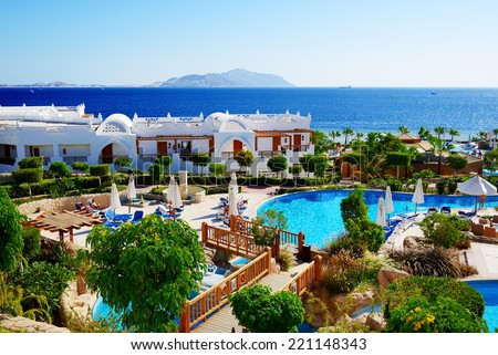 SHARM EL SHEIKH, EGYPT -  NOVEMBER 28: The tourists are on vacation at popular hotel on November 28, 2012 in Sharm el Sheikh, Egypt. Up to 12 million tourists have visited Egypt in year 2012.