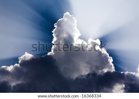 Sun Rays shine through a large cloud