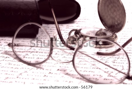Photo of Eyeglasses, Letter and Pocket Watch In Duotone With Blur Effect.