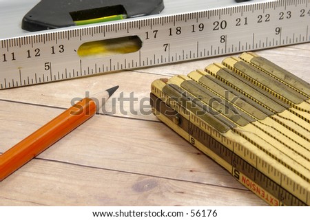 Photo of a Level, Pencil and Ruler.