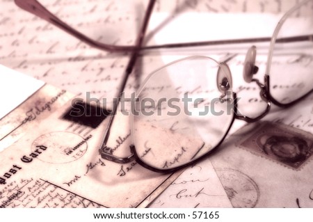 Photo of Eyeglasses and Letters With Color and Blur Effect