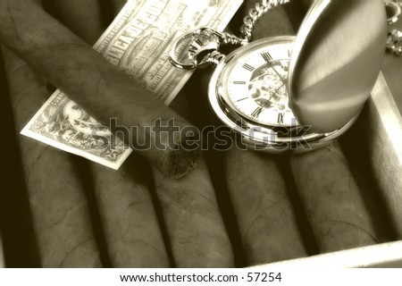 Photo of a Cigar Box and Pocket Watch