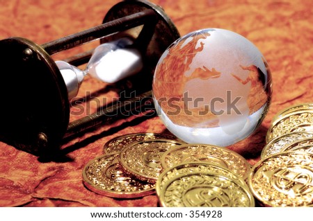 Glass Globe WIth Gold Coins and Hour Glass.