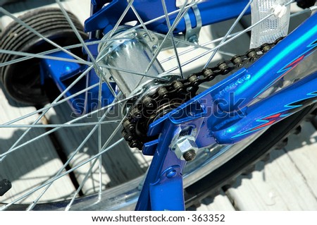 Photo of a Bike Chain and SPokes