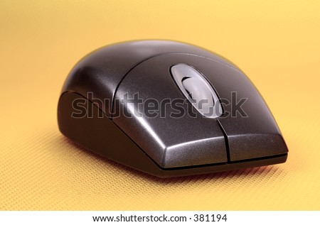 Computer Mouse on a Yellow Background