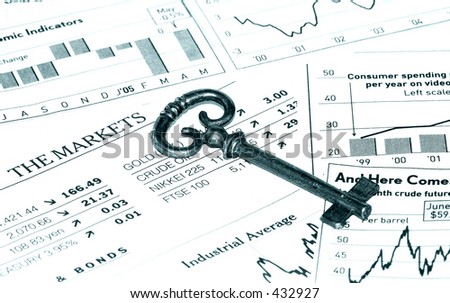 Key and Stock Charts.  Key To Success Concept.