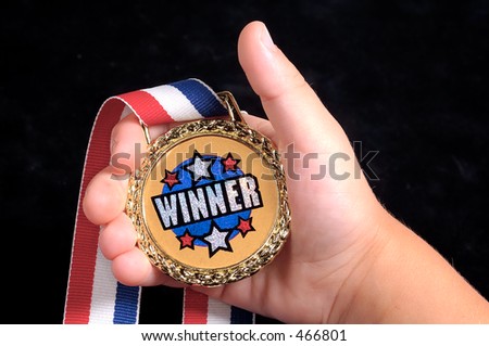 Hand With an a Award