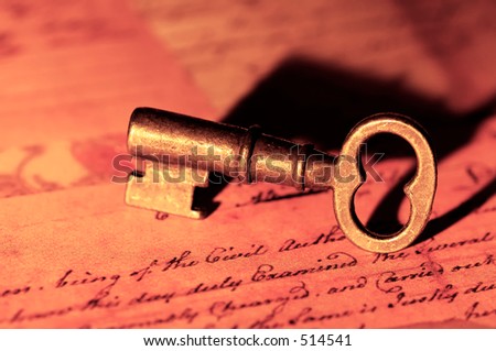 Photo of a Vintage Key and Letters.
