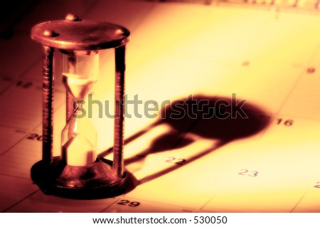 Hourglass on a Calendar With Creative Lighting.  See Portfolio For Similar Concepts.