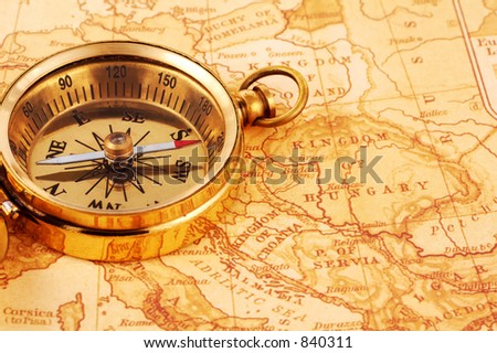 Photo of a Compass on a Map