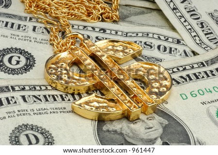 stock photo : Gold Dollar Sign Necklace and Money