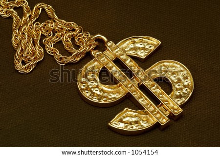 stock photo : Gold Dollar Sign Necklace