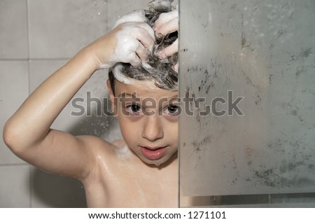 stock photo Child Taking a Shower