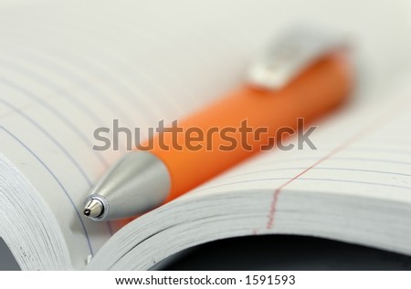 Ballpoint Pen in a Notebook