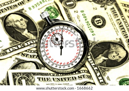 Time is Money Concept - Stopwatch and Money