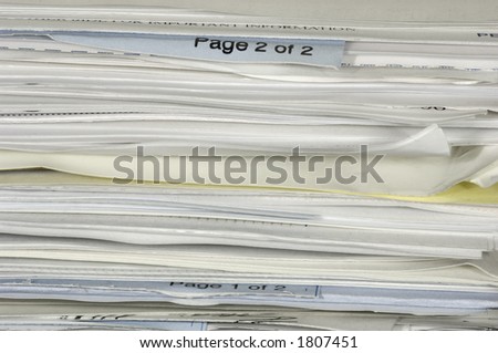 Stack of Various Office Papers and Bills
