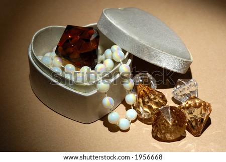 Photo of a Heart Shaped Box With Various Gems and Jewels