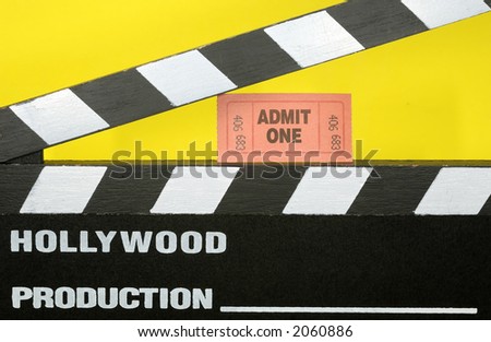 Photo of a Hollywood Movie Slate and a Admit One Ticket - Movie Concept