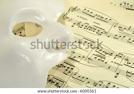 Photo of a Mask on Sheetmusic - Opera / Theater Concept