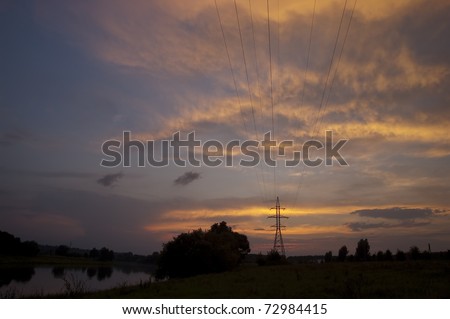 Electricity pylon at sunset in Lithuanian Village
