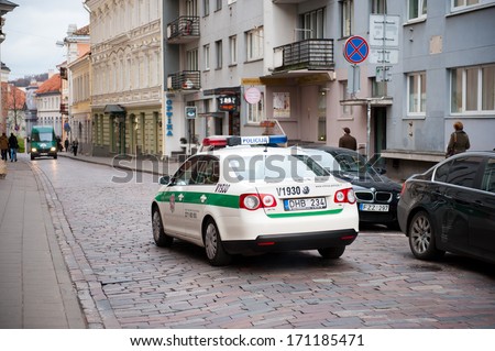 Vilnius - Oct 28: Lithuanian Police Patrol Vehicle Vw Jetta In Vilnius Old Town On Oct. 28, 2013 In Vilnius, Lithuania. The Main Policing Institution In Lithuania Is The Lithuanian Police.