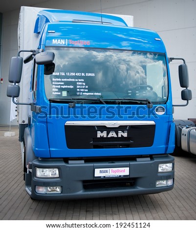 VILNIUS - MAY 9: MAN TGL 12.250 delivery truck on May 9, 2014 in Vilnius, Lithuania. MAN AG, is a German mechanical engineering company. MAN supplies trucks, buses, diesel engines and turbomachinery.