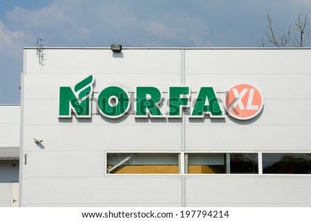 SVENCIONYS - JUN 8: NORFA store sign on June 8, 2014 in Svencionys, Lithuania. Norfa is one of Lithuania\'s biggest grocery chains. Norfa has 132 stores in Lithuania.
