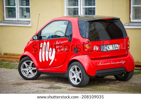 KLAIPEDA - JUNE 16: Smart Car parked up on June 16, 2014 in Klaipeda, Lithuania. Smart Automobile is a division of Daimler AG that manufactures and markets the Smart Fortwo.
