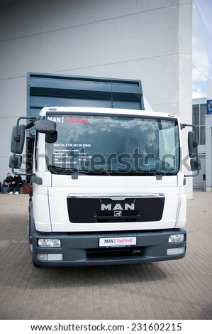 VILNIUS - MAY 9: MAN TGL 8.150 4x2 BB truck on May 9, 2014 in Vilnius, Lithuania. MAN AG, is a German mechanical engineering company. MAN supplies trucks, buses, diesel engines and turbomachinery.