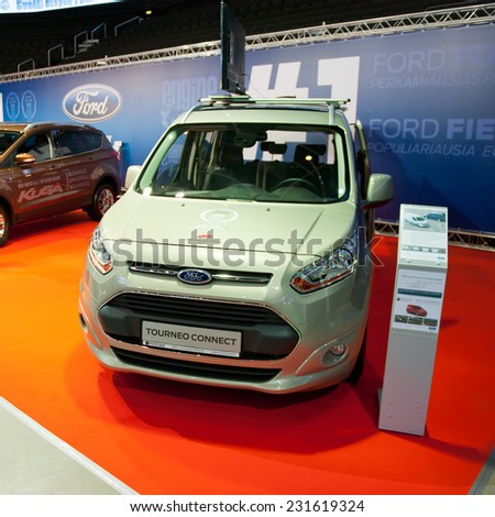 KAUNAS-SEP 19: Ford Tourneo Connect van on display on Sep. 19, 2014 in Kaunas, Lithuania. The all-new Ford Tourneo Connect is essentially a hard-working Transit Connect van with rear seats and windows