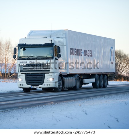 VILNIUS - JAN 7: DAF XF truck on motorway in winter on Jan. 7, 2015 in Vilnius, Lithuania. The DAF XF is a range of trucks produced by the Dutch manufacturer DAF since 1997.
