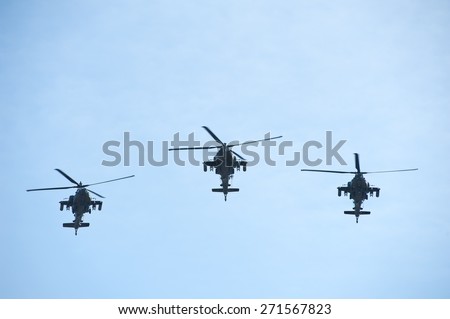 VILNIUS - MAR 22: US Army Apache AH-64 Helicopters during the Dragoon Ride Exercise on March 22, 2015 in Vilnius, Lithuania. The Boeing AH-64 Apache is a four-blade, twin-turboshaft attack helicopter.