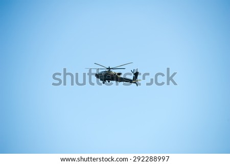 VILNIUS - MAR 22: US Army Apache AH-64 Helicopter during the Dragoon Ride Exercise on March 22, 2015 in Vilnius, Lithuania. The Boeing AH-64 Apache is a four-blade, twin-turboshaft attack helicopter.