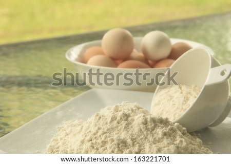 Baking Flour in Outdoor Setting with Eggs