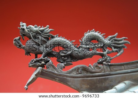 An oriental dragon found in china town with red background