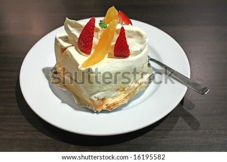 White Sponge Cream Cake in a Restaurant